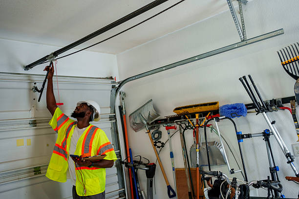 Professional Garage Door Panel Replacement technician working in Buhl, MN